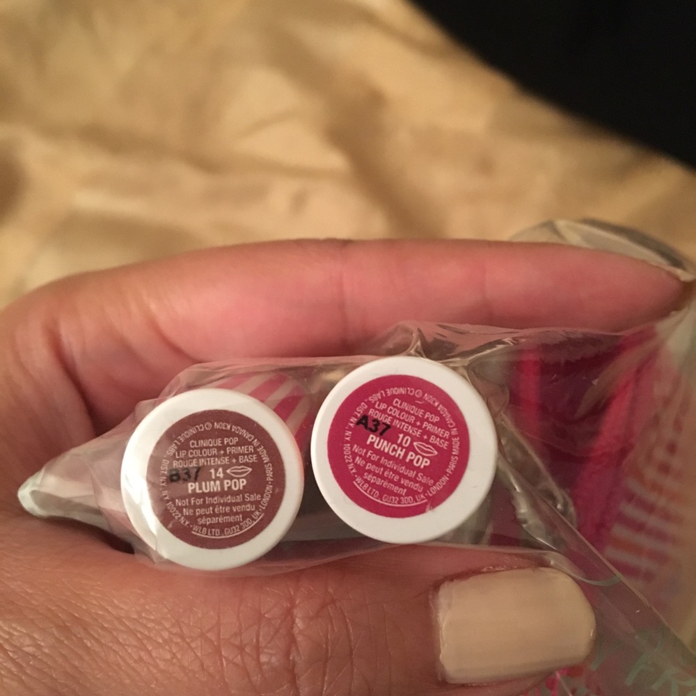 Clinique lip sticks and mini bag